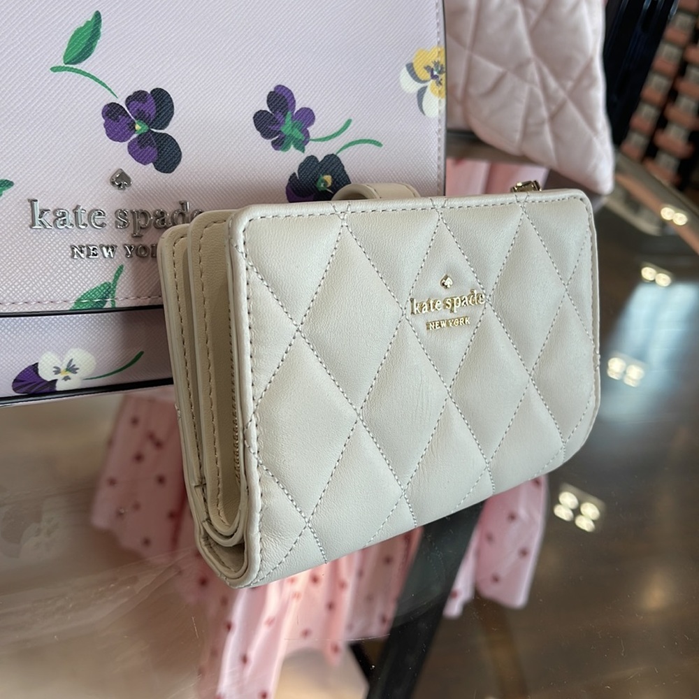 Kate Spade Carey Medium Compartment Bifold Wallet
COLOR: Parchment - Picture 9 of 16